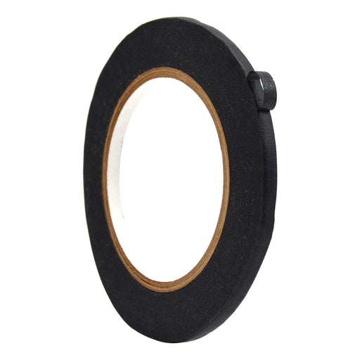 Close up of a roll of Flatback Tape - black 1/4 inch