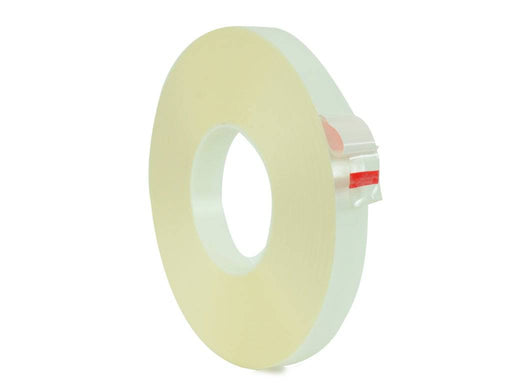 White roll of transfer tape acrylic adhesive