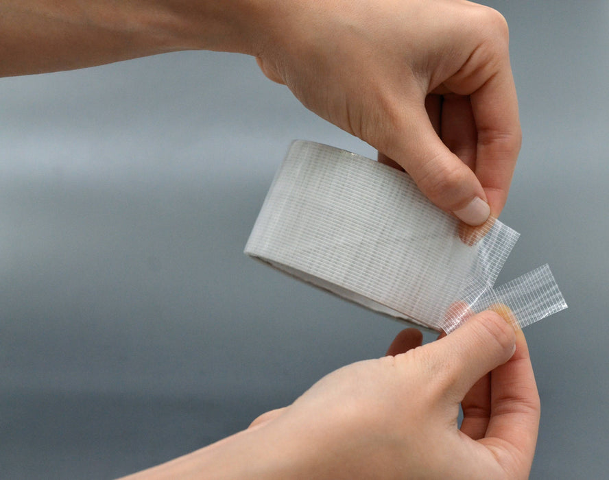 hd clear duct tape being easily ripped by hand for ease of use