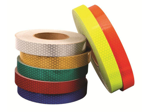 multiple rolls of reflective tape, white, yellow, green, red, yellow, orange, blue