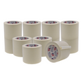 Multiple Stacked rolls of 1 inch wide White or Beige Masking Tape, Shows made in USA logo