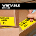 yellow colored Nametag Sticker or Direct Thermal  Label on a brown shipping box 