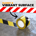 infographic of black and yellow hazard tape saying it is  highly visible, and glossy
