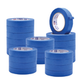 mulitple stacks of blue painters tape rolls
