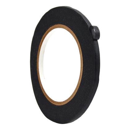 Close up of a roll of Flatback Tape - black 1/4 inch
