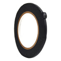 Close up of a roll of Flatback Tape - black 1/4 inch