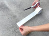 Double Sided Polypropylene Tape being used on concrete floor