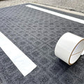 Double Sided Polypropylene Tape being used on carpet backing