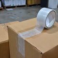 clear duct tape near me used to sea a brown shipping box