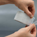 hd clear duct tape being easily ripped by hand for ease of use