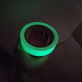Close up of glow in the dark tape roll glowing - 1  inch