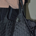Shrink Wrap Tape used to fix womans bag