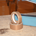 Close up of  Fiberglass Cloth Teflon Tape roll 4  inch wide