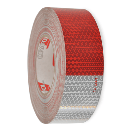 Close up of a red and white reflective tape