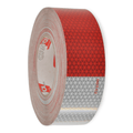 Close up of a red and white reflective tape