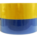 2 rolls of reflective tape , one yellow , one blue
