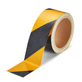 close up of a roll of black and yellow Striped Retro Reflective Tape for Safety Signage - 3 inch