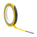 Roll of  black and yellow saftey hazard floor tape 