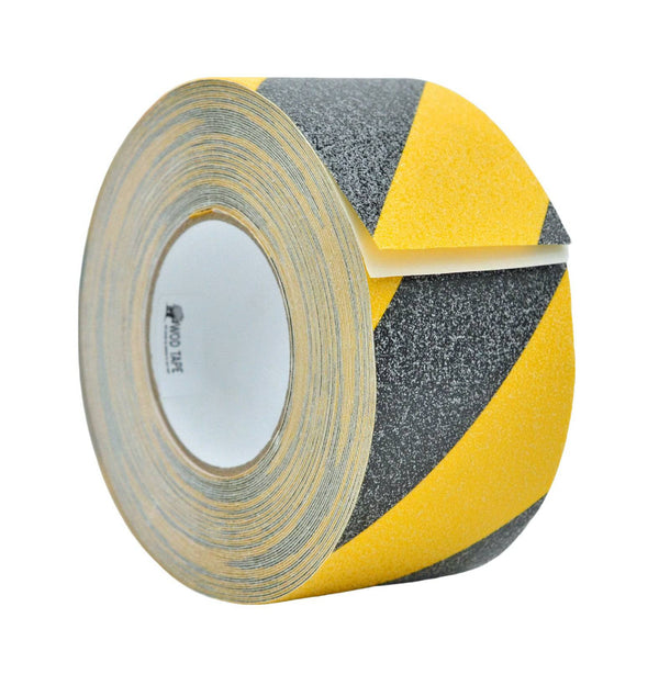 close up of a roll of antislip grip tape - available in bulk or by the roll in black, yellow, white, red, orange, blue, green, safety hazard stripes and multiple different sizes