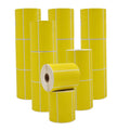 Multiple Stacked rolls of Yellow  Nametag Sticker Thermal Label Roll 